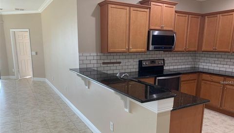 5409 SUNSET FALLS DRIVE