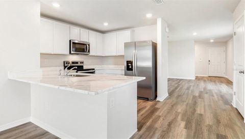 1833 HAMMOCK TRACE DRIVE