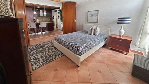 6165 AVE. ISLA VERDE