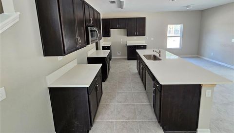12569 Creekside Manor
