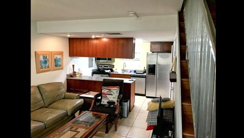 8950 SW 69th Ct APT 215