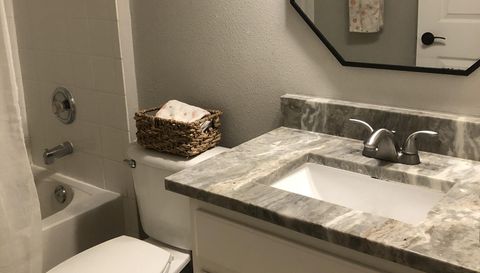 4606 Whispering Wind Ave