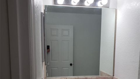 5016 SUNRIDGE PALMS DRIVE